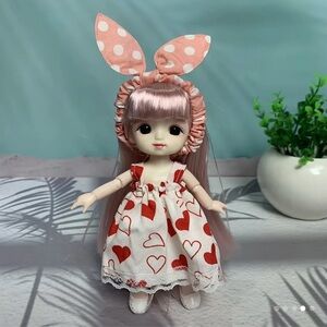 Adorable Pink and White Doll with Heart Dress